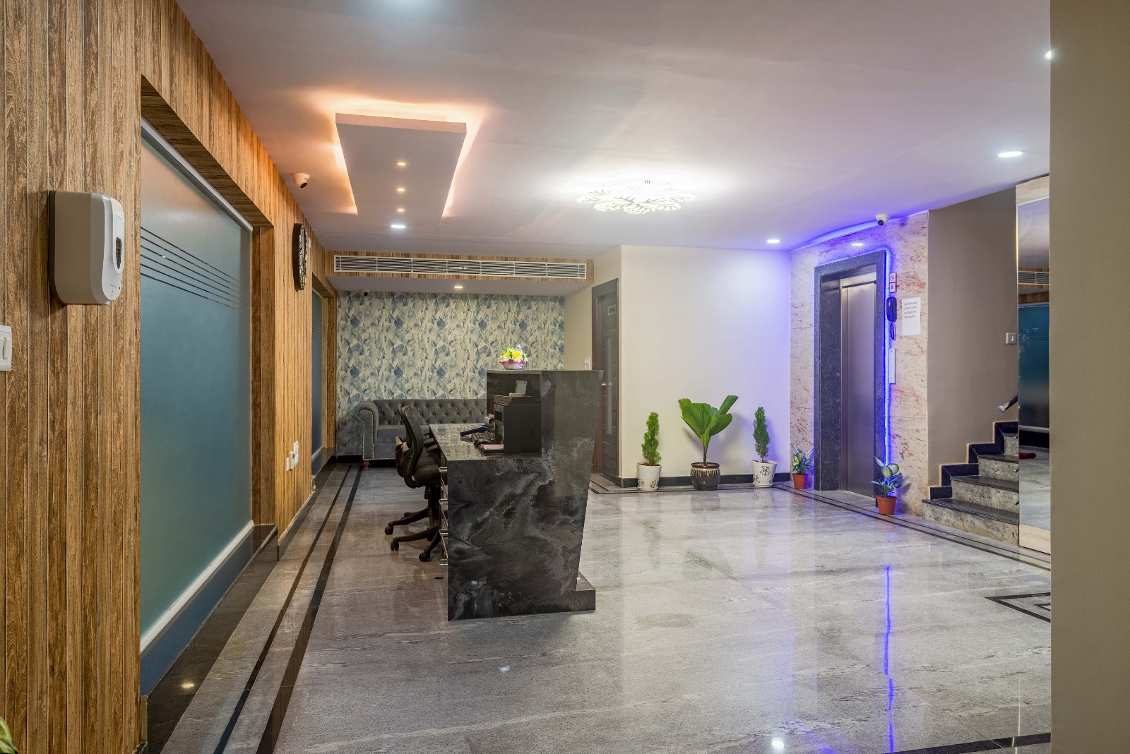 Corporate travelers at Zenith Suites near Manyata Tech Park